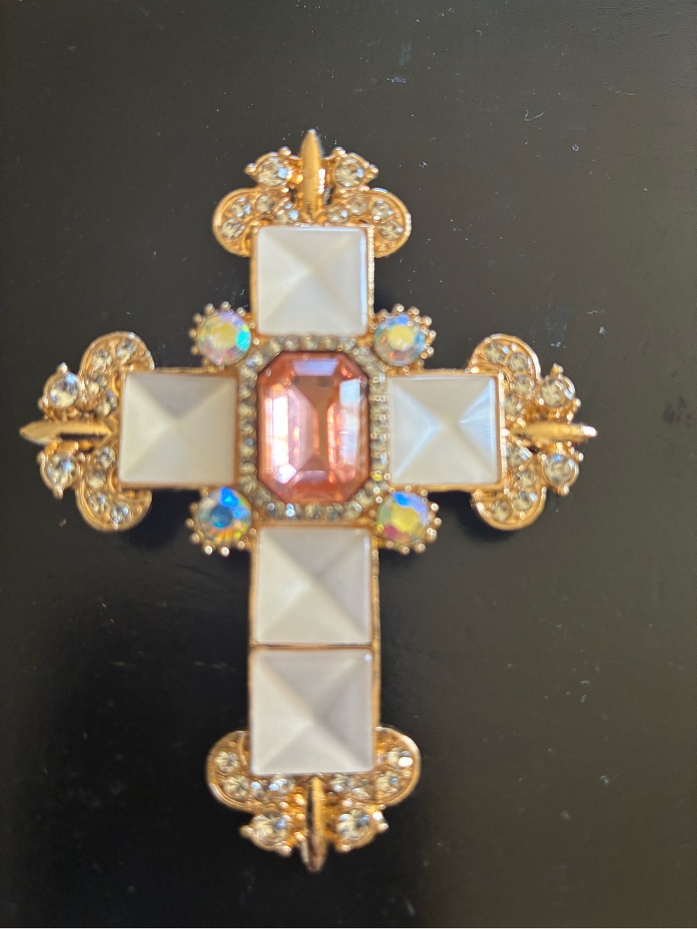 Gold-Tone Cross Brooch with Pink Center Stone